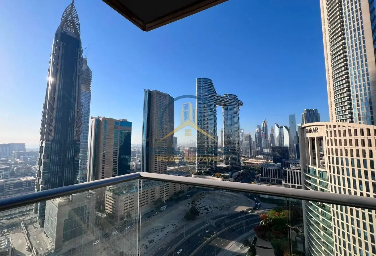 HIGH FLOOR | BURJ VIEW | UNFURNISHED |CHILLER FREE