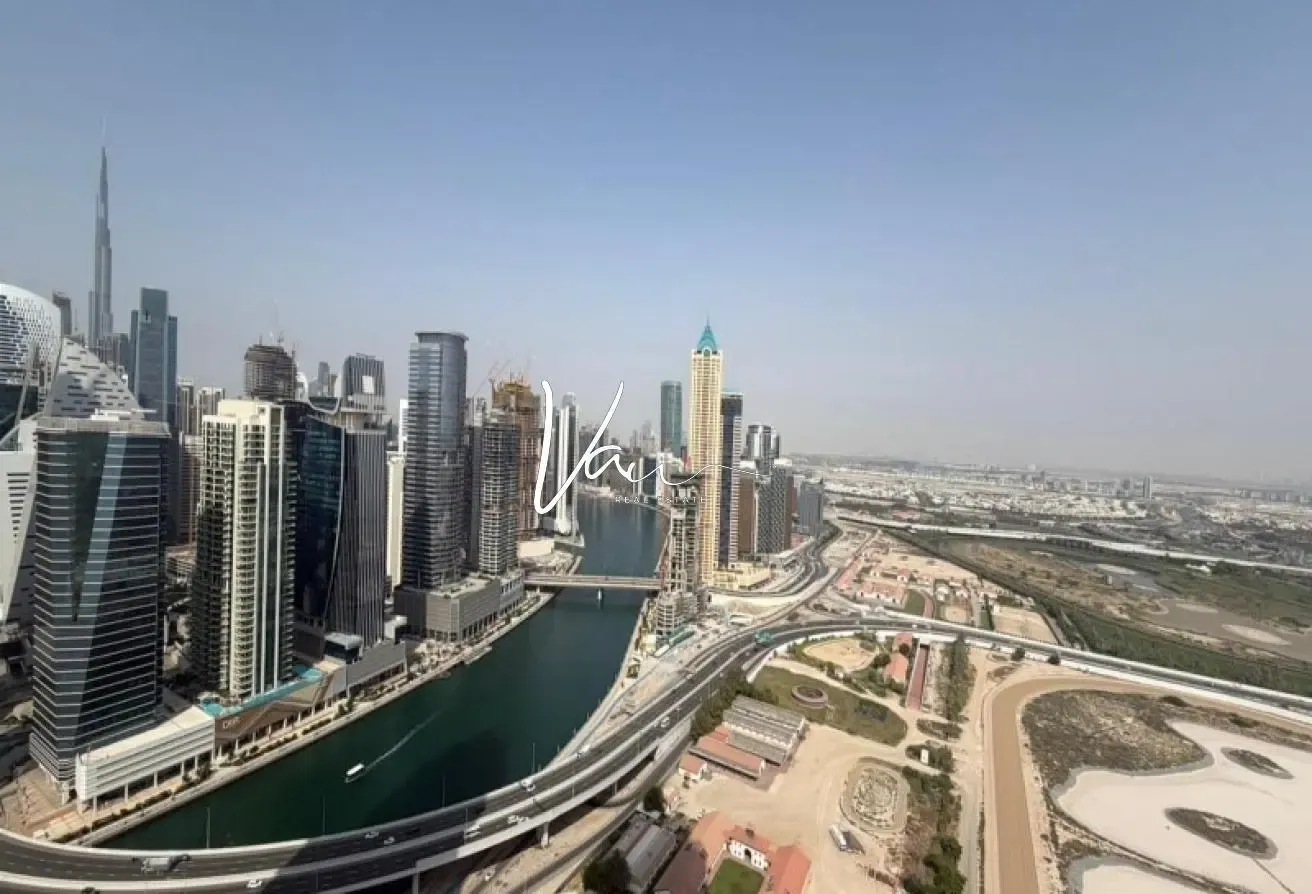 Modern 1BR Apart. | Canal and Burj Khalifa View