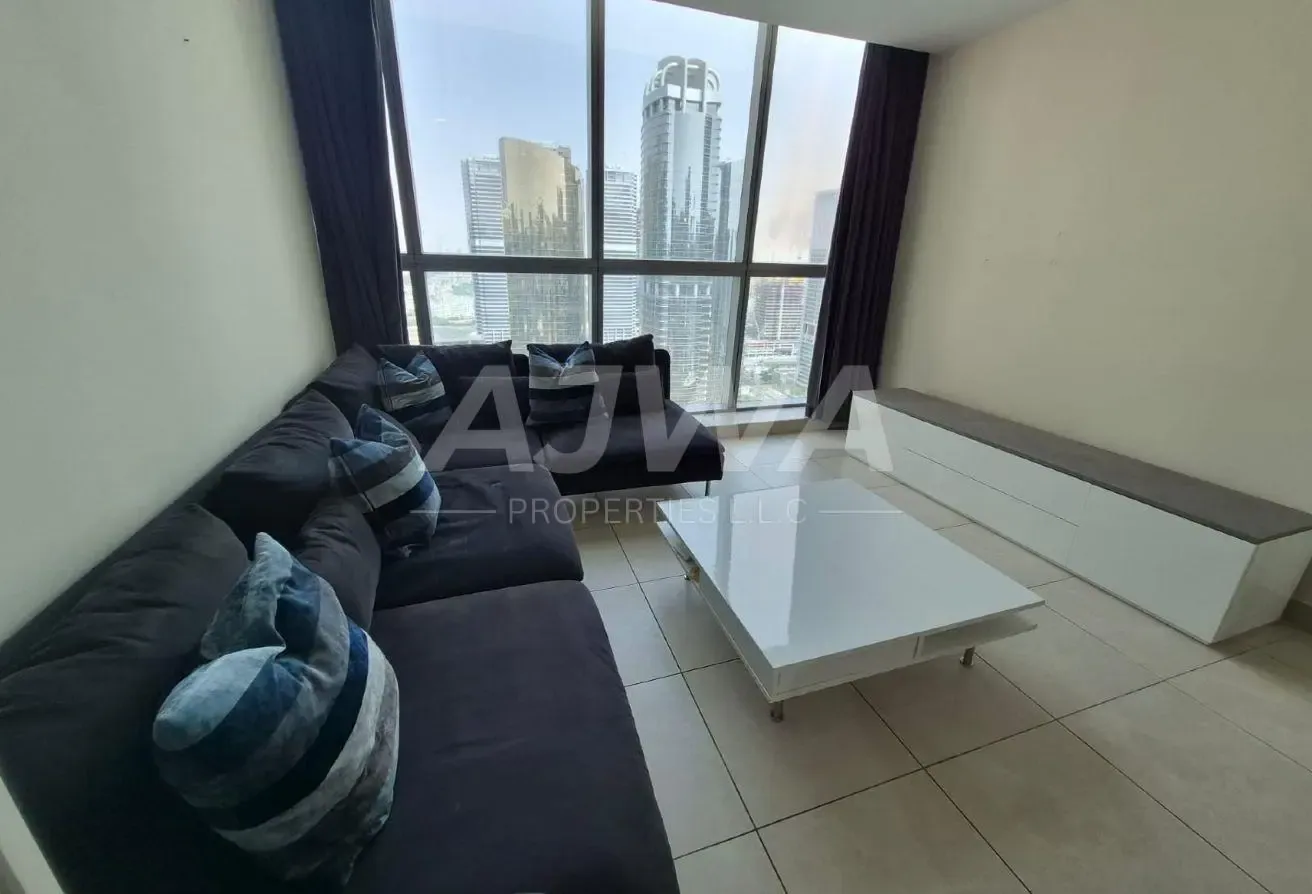 Semi-Furnished 2BHK | High Floor | Near DMCC Metro