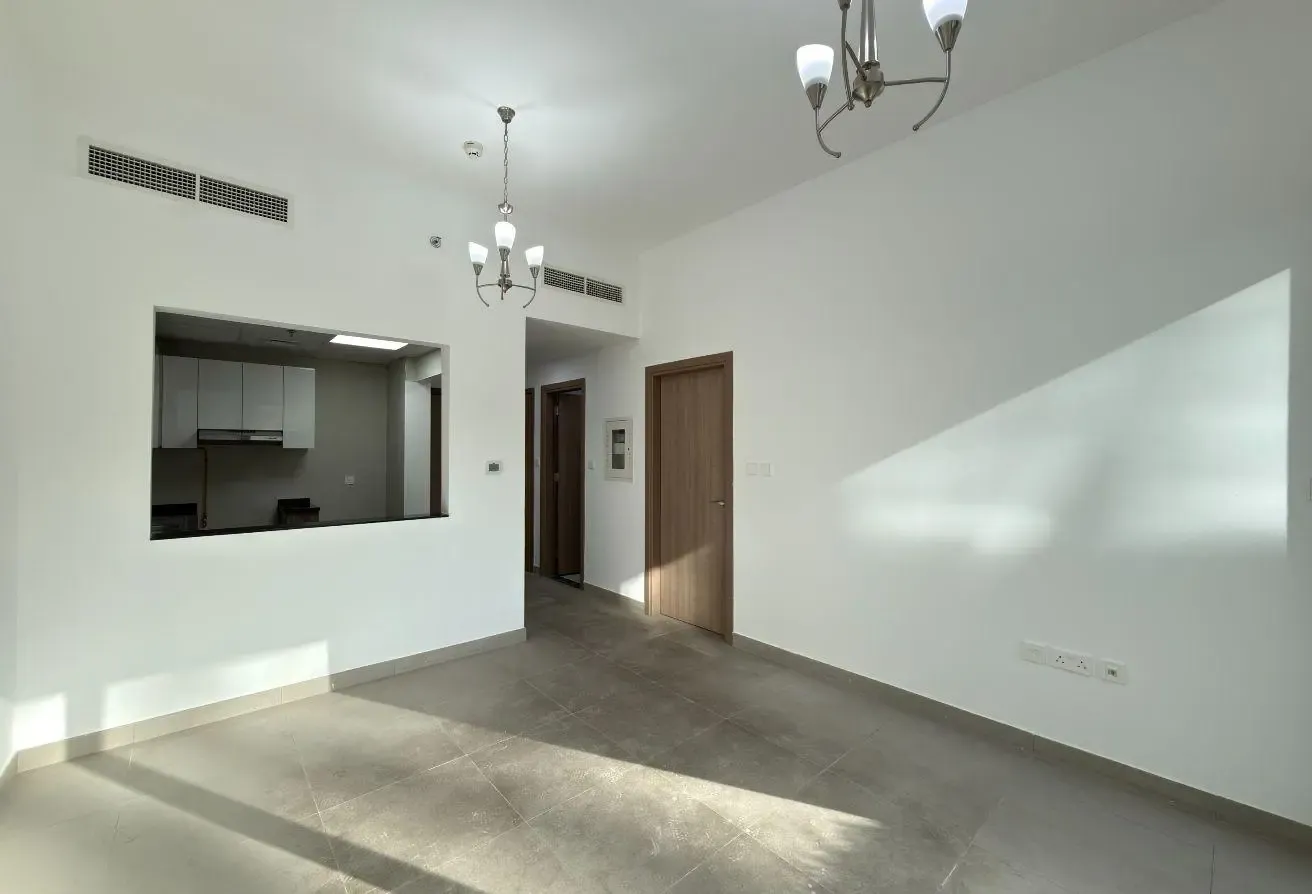 Modern 1BR | Balcony with Open View | Warsan 4
