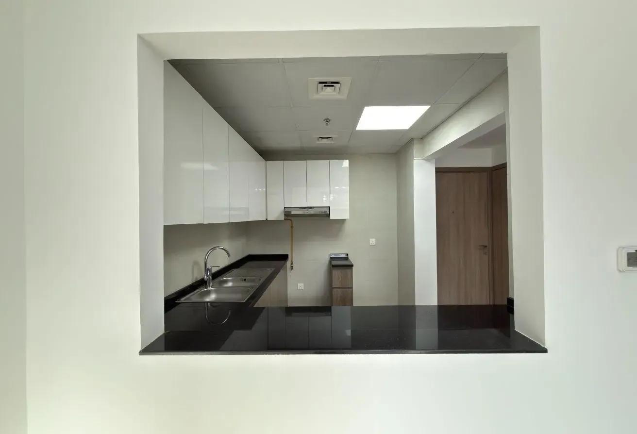 Modern 1BR | Balcony with Open View | Warsan 4