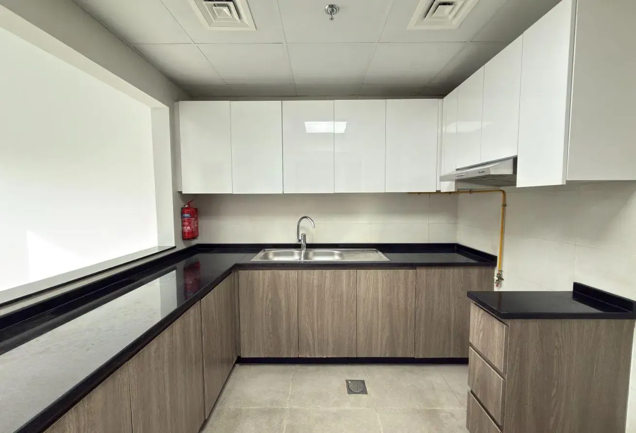 Modern 1BR | Balcony with Open View | Warsan 4