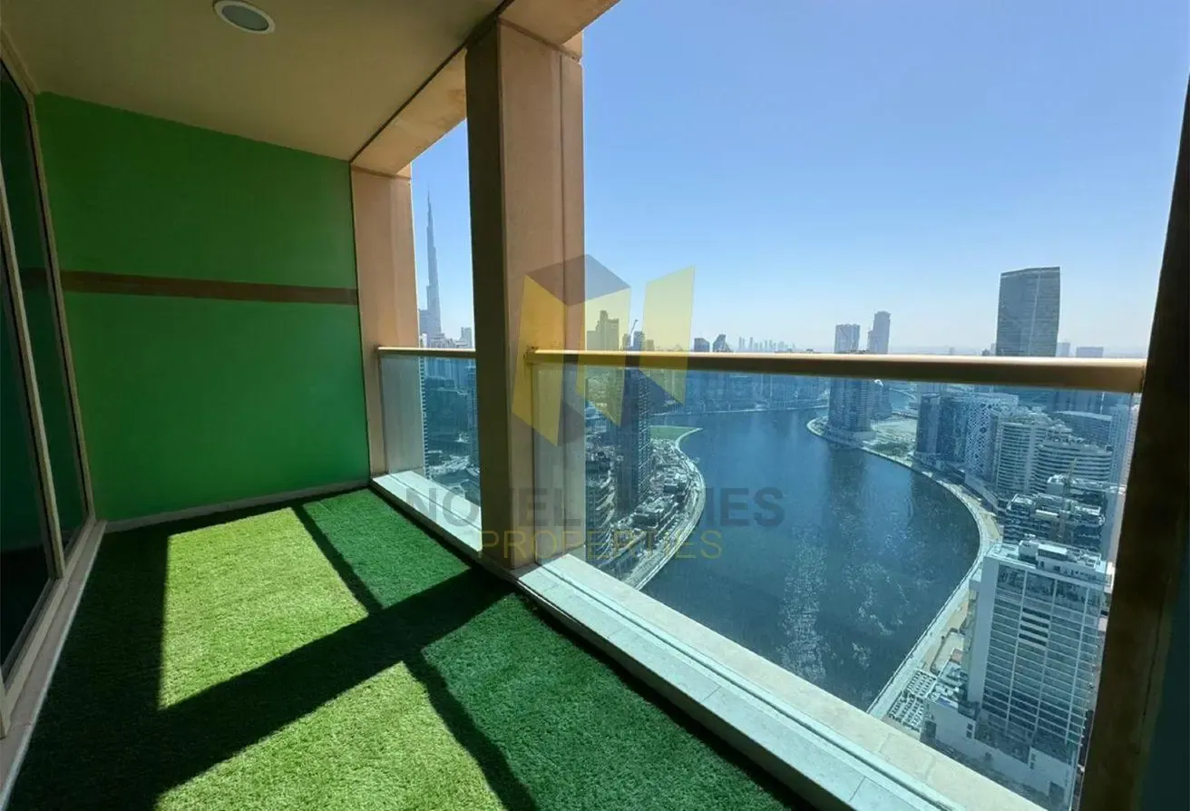 Spacious 2BR | Burj & Canal View | Prime Location