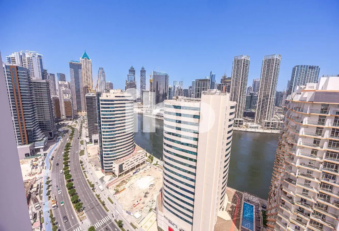 High Floor | Canal & Burj view | Semi furnished