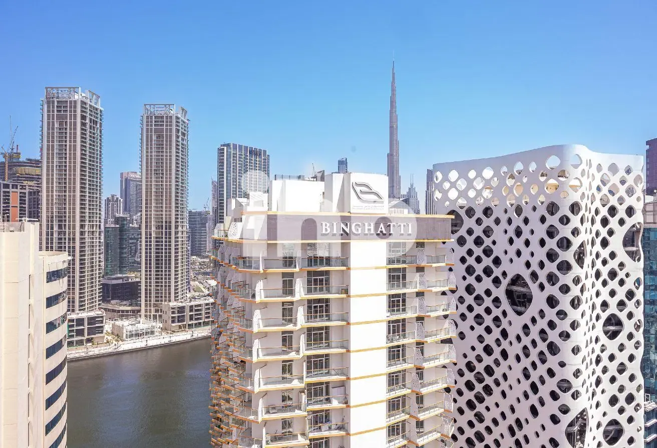 High Floor | Canal & Burj view | Semi furnished