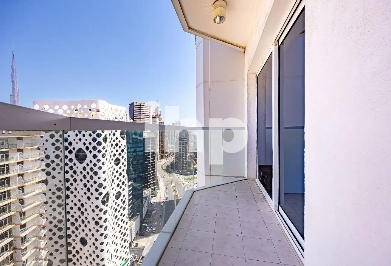 High Floor | Canal & Burj view | Semi furnished