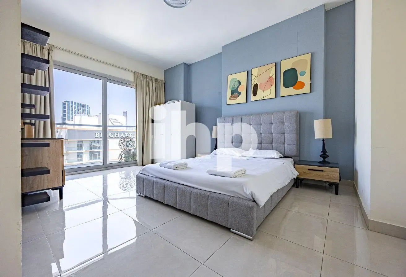 High Floor | Canal & Burj view | Semi furnished