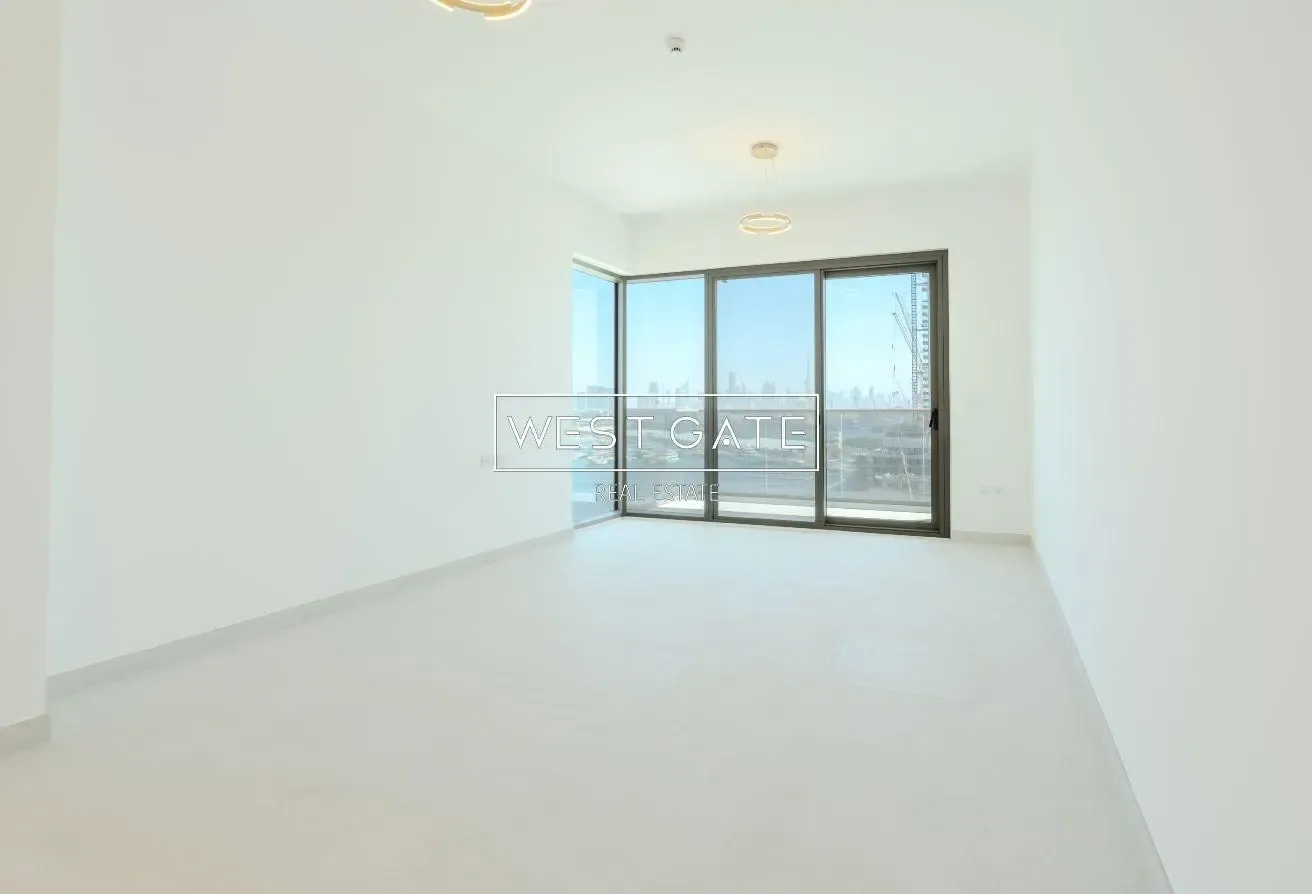 High-Floor 1BR | Burj Khalifa & Sea Views