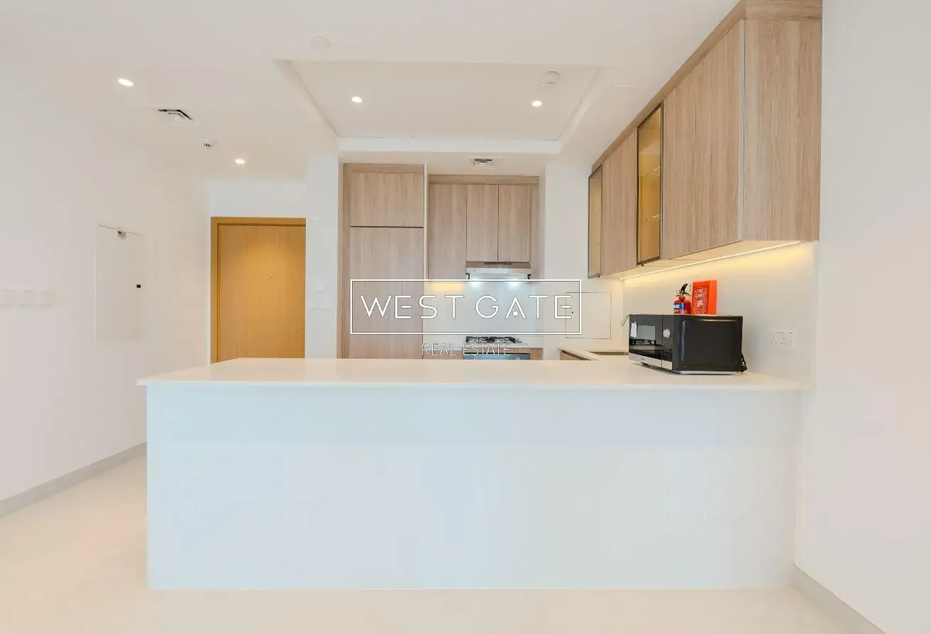 High-Floor 1BR | Burj Khalifa & Sea Views