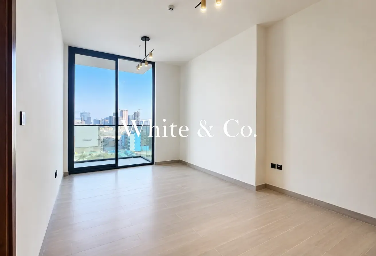 Unfurnished | Multiple Cheques | High Floor