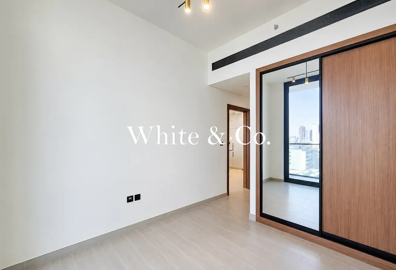 Unfurnished | Multiple Cheques | High Floor
