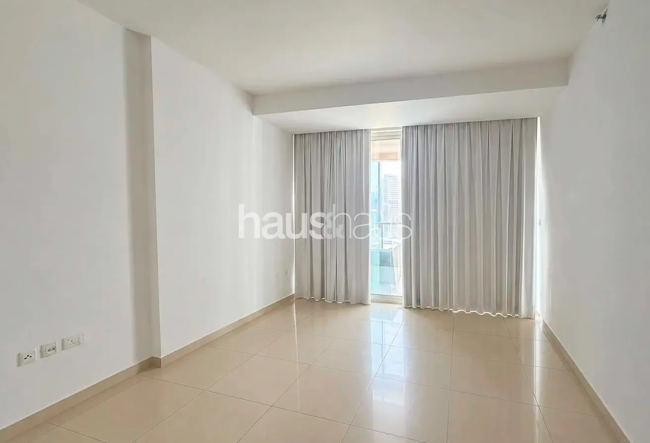High Floor | Spacious Layout | Partial Lake View