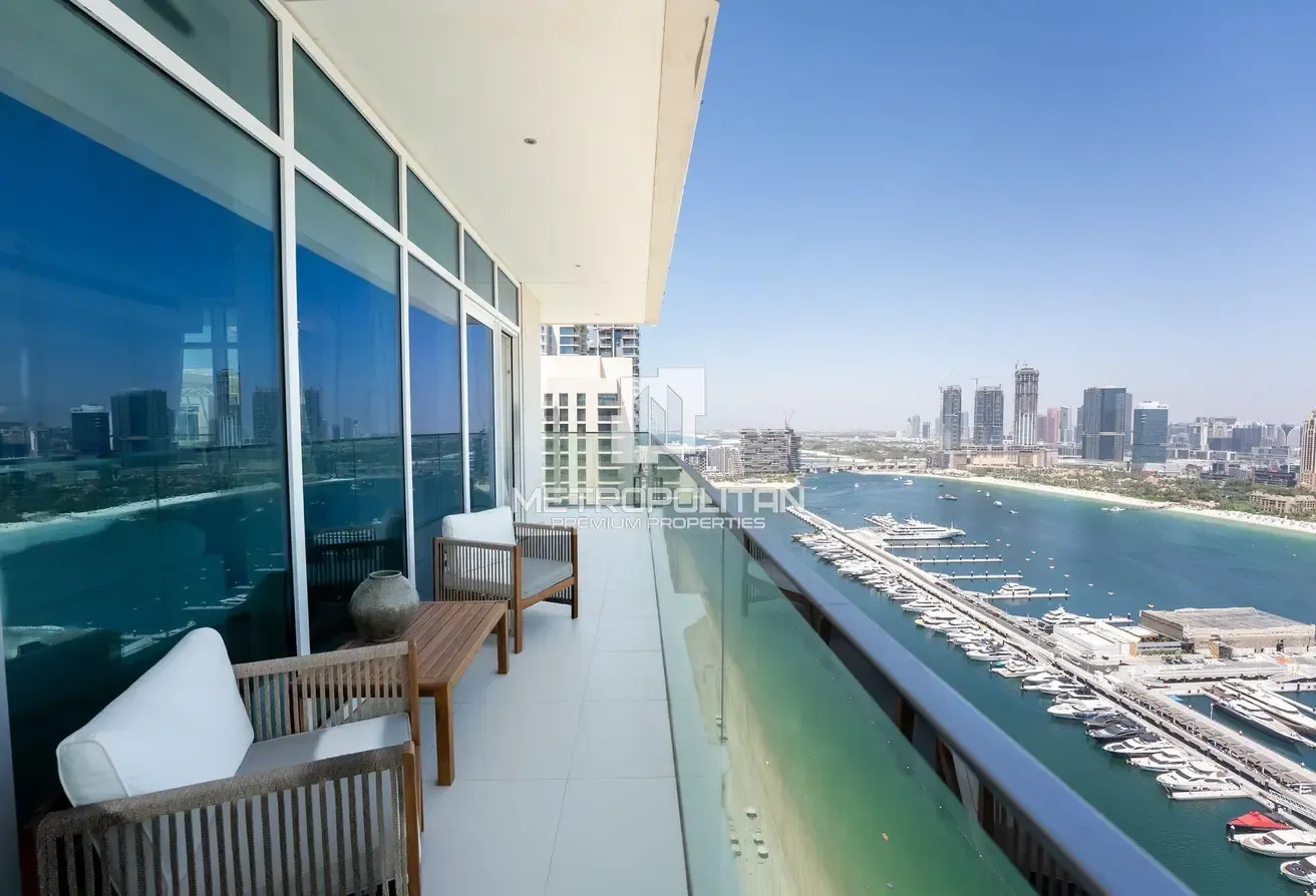 Top Floor Unit | Turnkey | Marina and Palm View