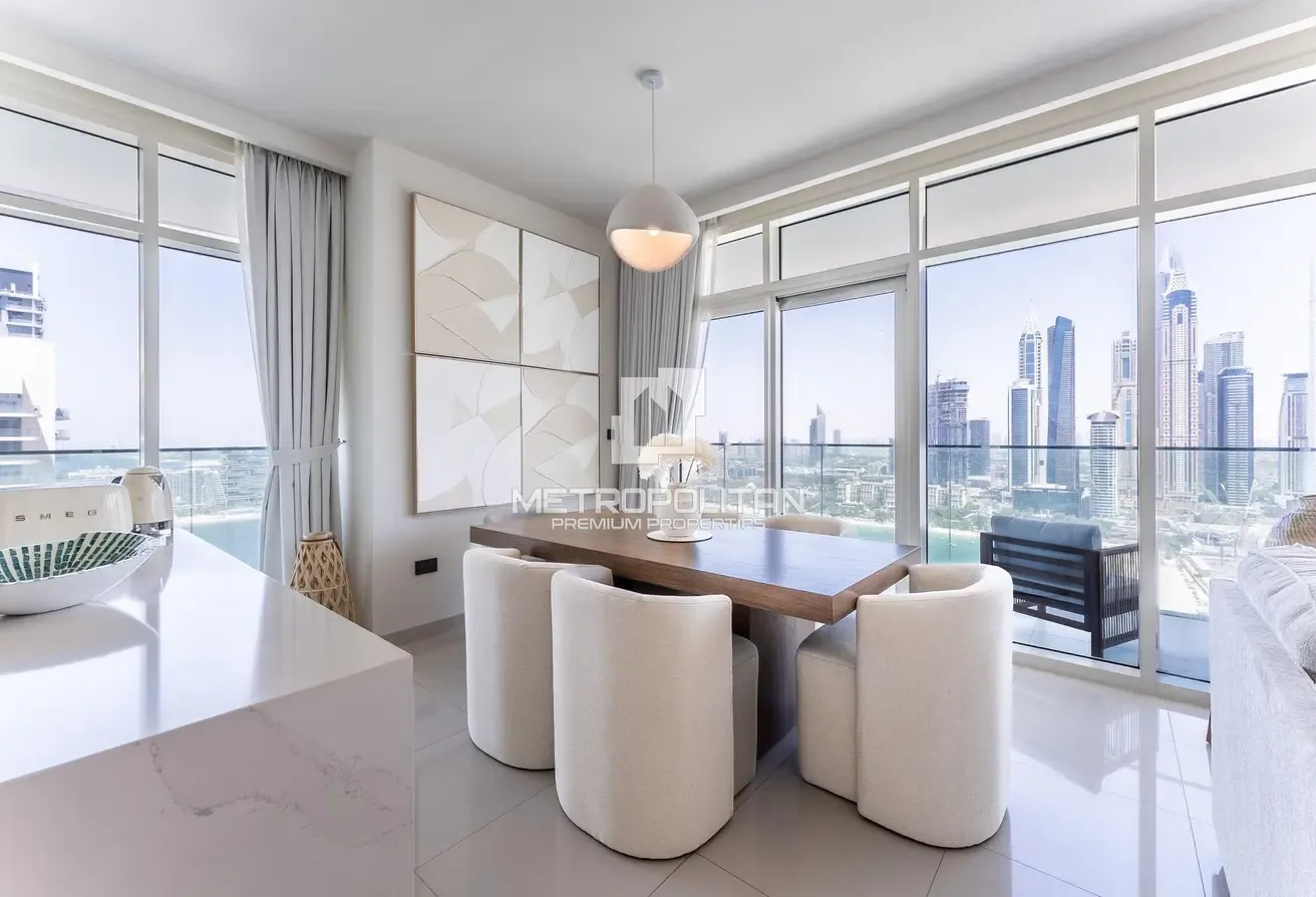 Top Floor Unit | Turnkey | Marina and Palm View