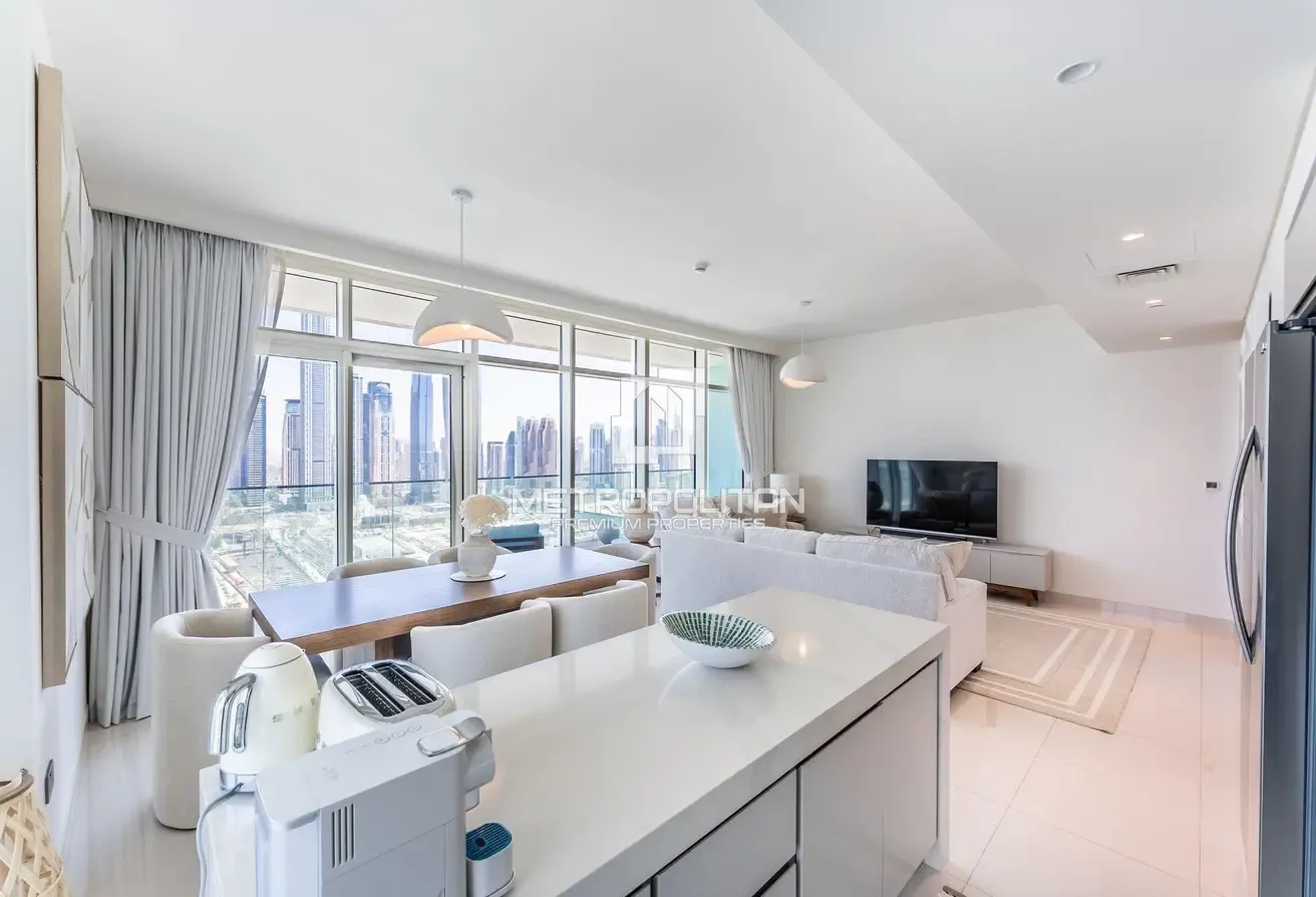 Top Floor Unit | Turnkey | Marina and Palm View