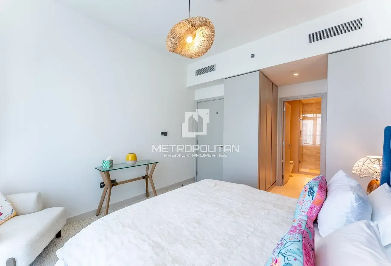 Top Floor Unit | Turnkey | Marina and Palm View