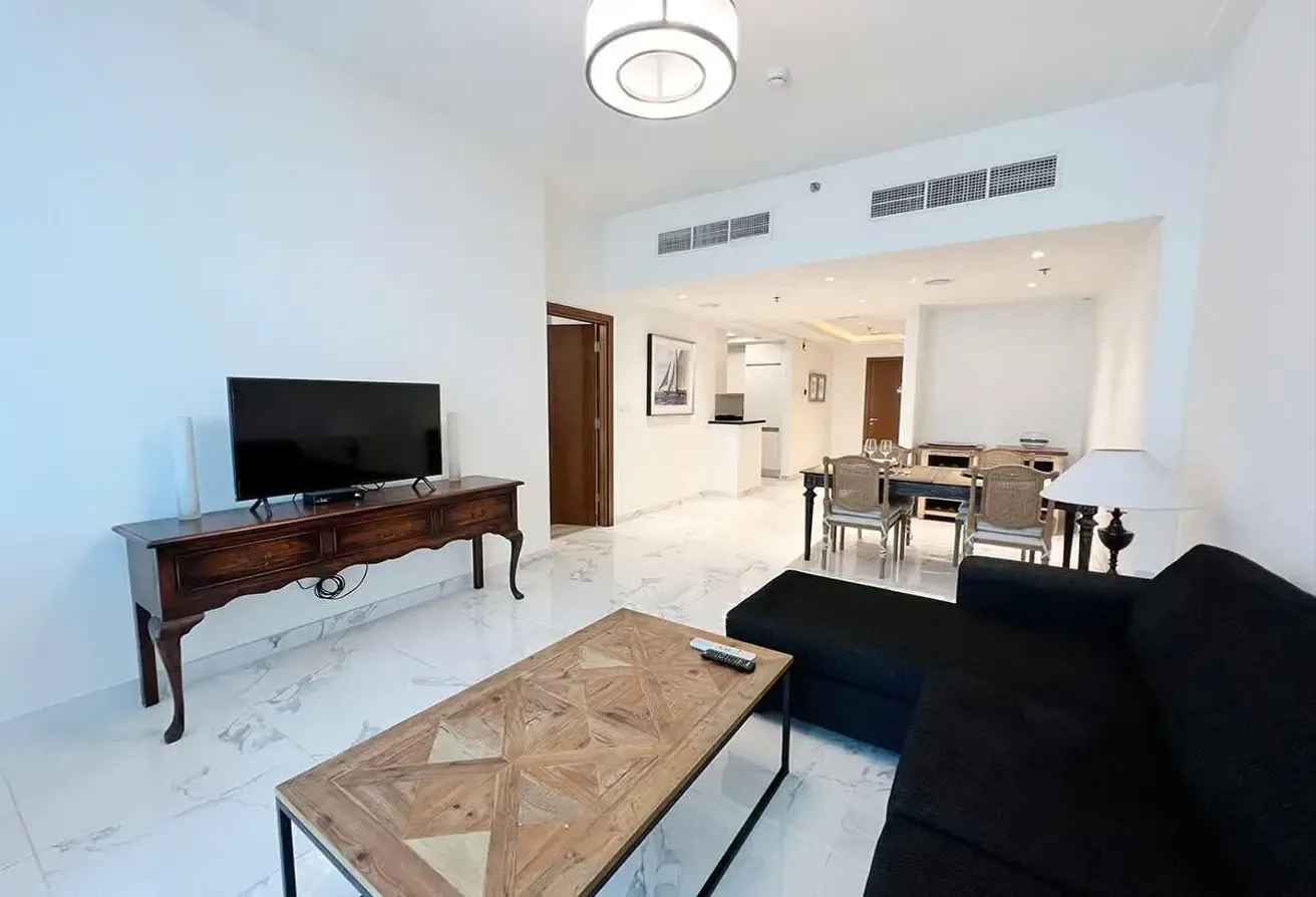 Noora Tower 1BR: Dubai Luxury with Pool & Gym