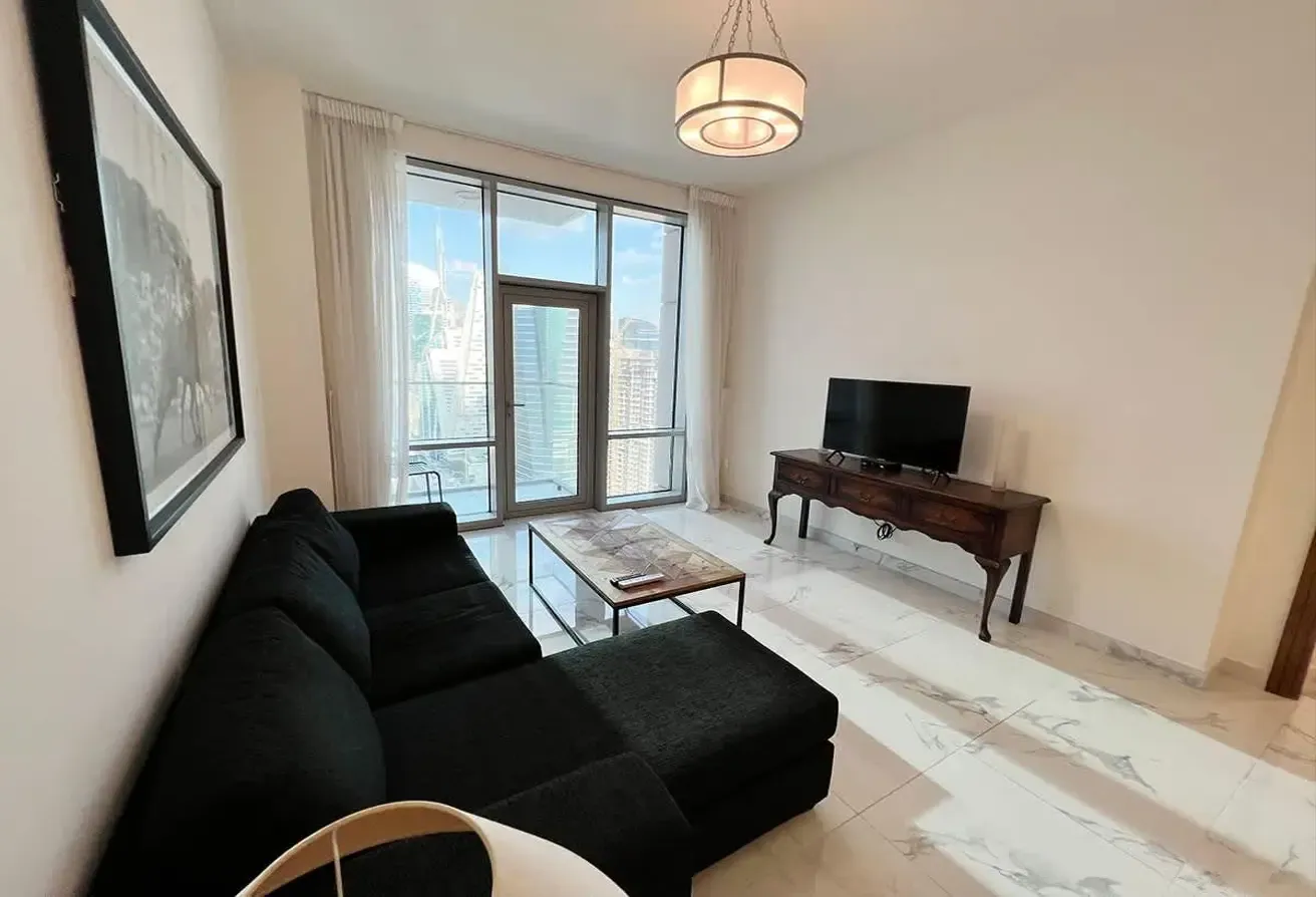 Noora Tower 1BR: Dubai Luxury with Pool & Gym