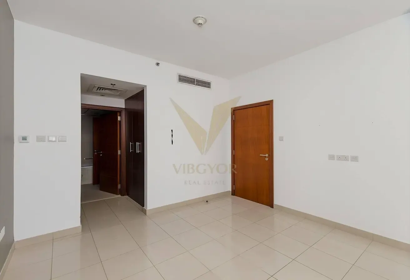 Vacant 1BR Apartment | Pool - Boulevard View