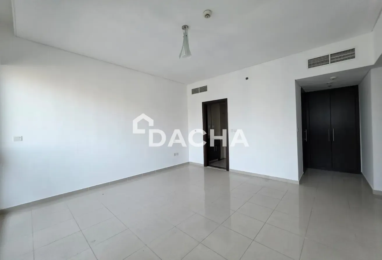 Unfurnished | Partial Marina View | High Floor