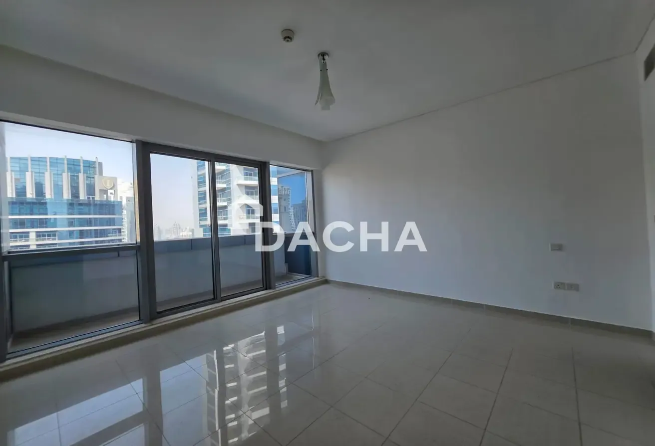 Unfurnished | Partial Marina View | High Floor