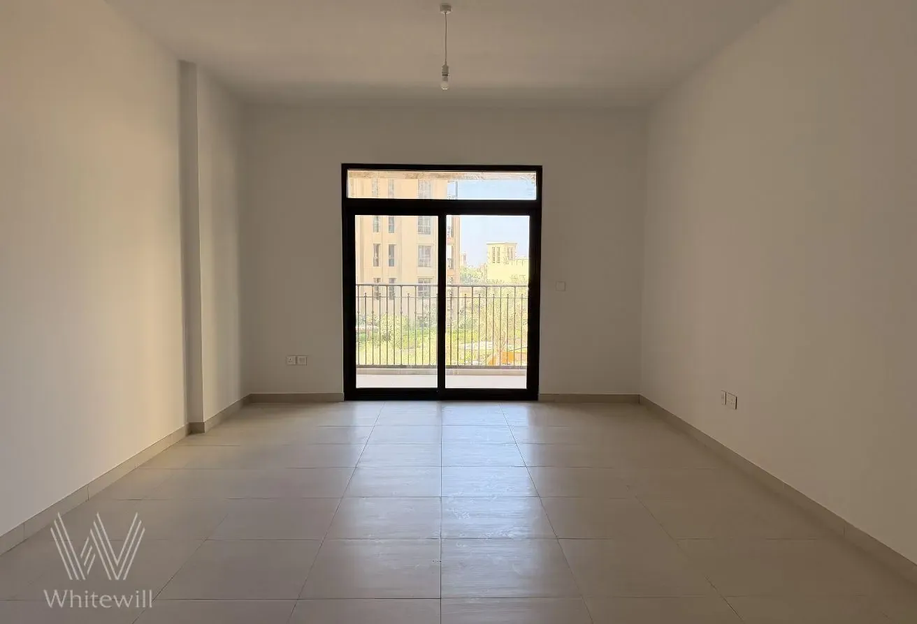 Bright Unfurnished Apartment with Community View