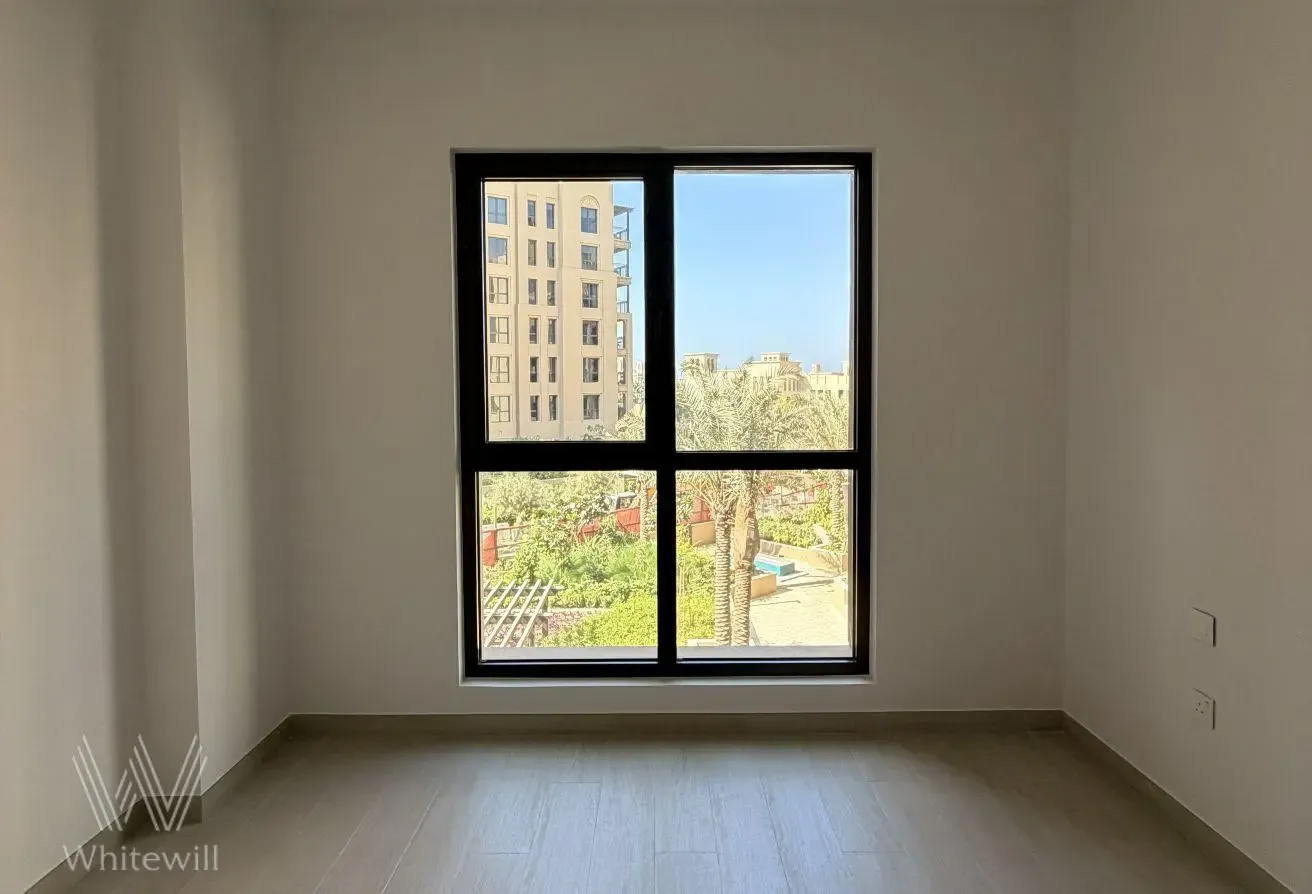 Bright Unfurnished Apartment with Community View