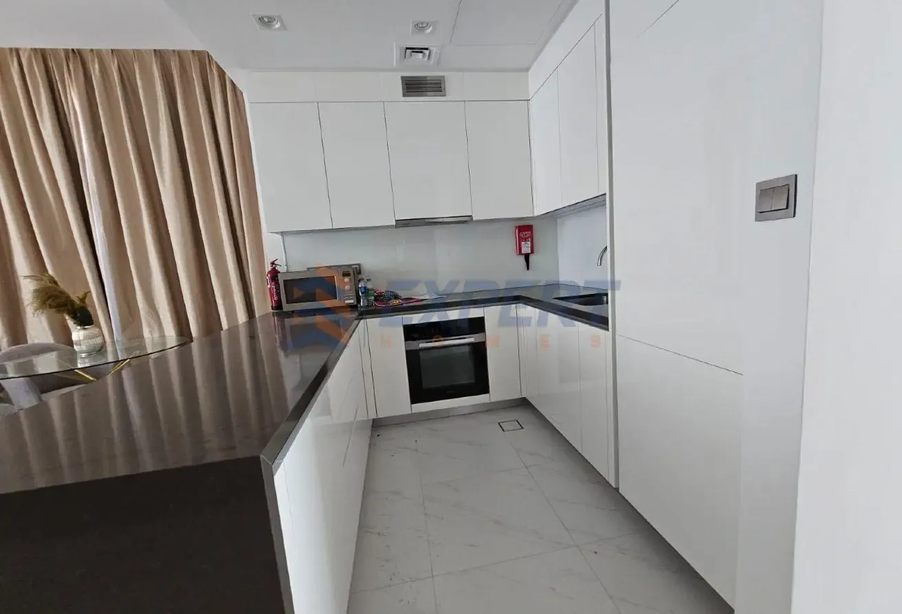 Below OP | Lagoon Facing | Furnished and Ready