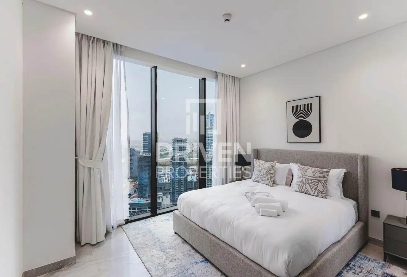 High Floor | Canal and Burj View | Furnished