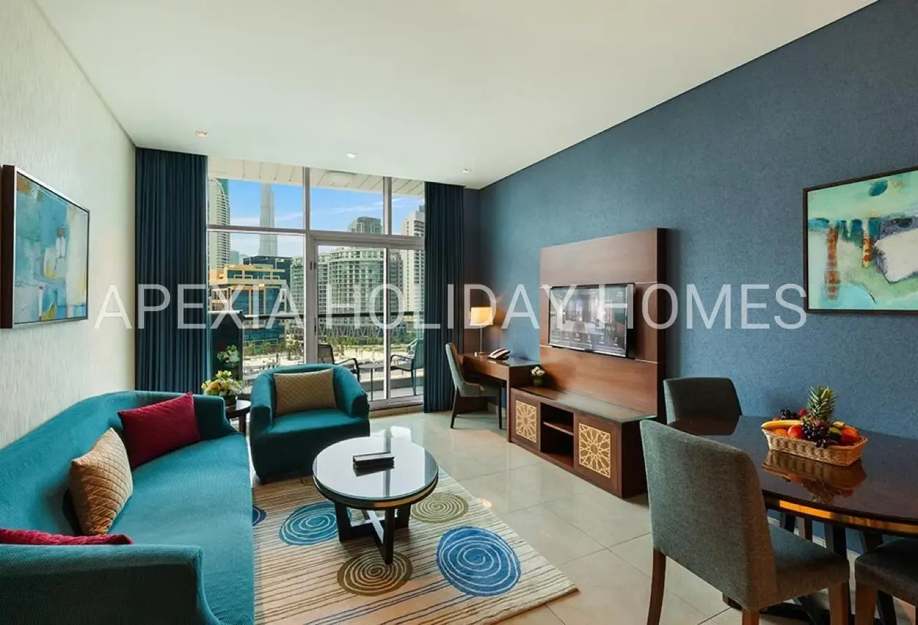 Burj & Canal View 1BR | Furnished Apartment