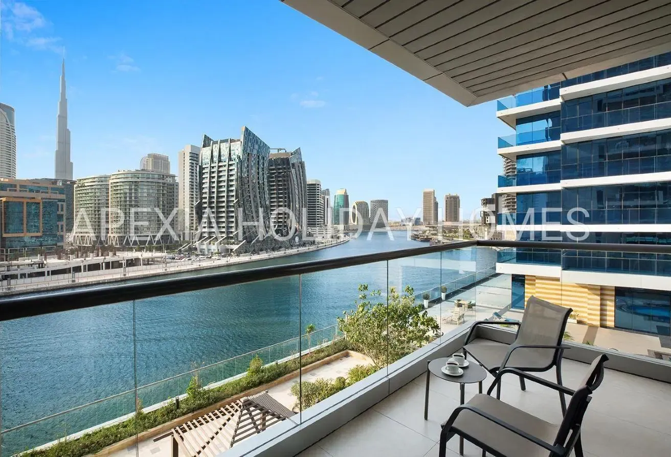 Burj & Canal View 1BR | Furnished Apartment