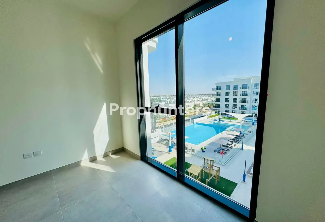 Modern 2BR Apartment | Pool View | Balcony