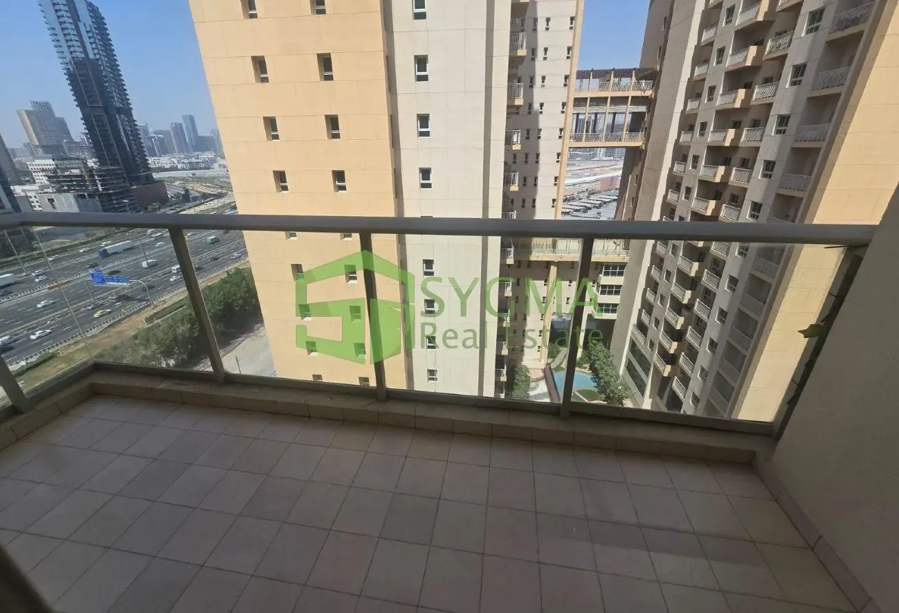 SPACIOUS 1 BEDROOM WITH BALCONY WITH PARKING