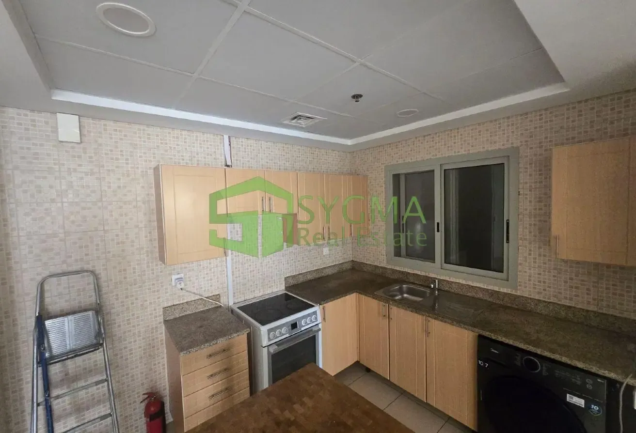 SPACIOUS 1 BEDROOM WITH BALCONY WITH PARKING