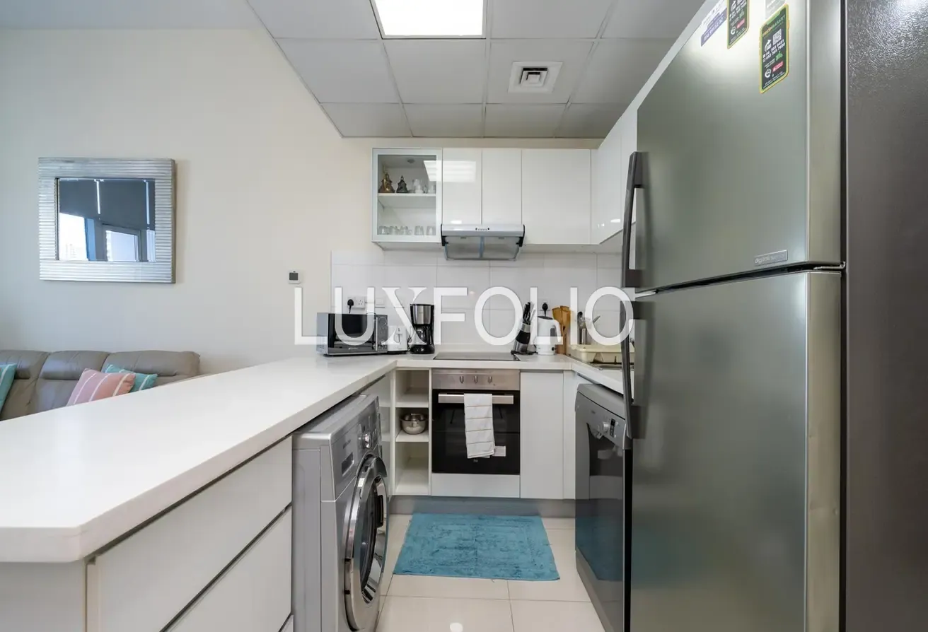 High Floor | 12 Cheques | Marina View