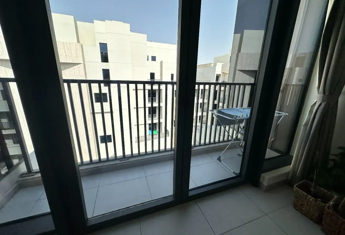 2BR Apartment in Mirdif with Balcony and Pool View