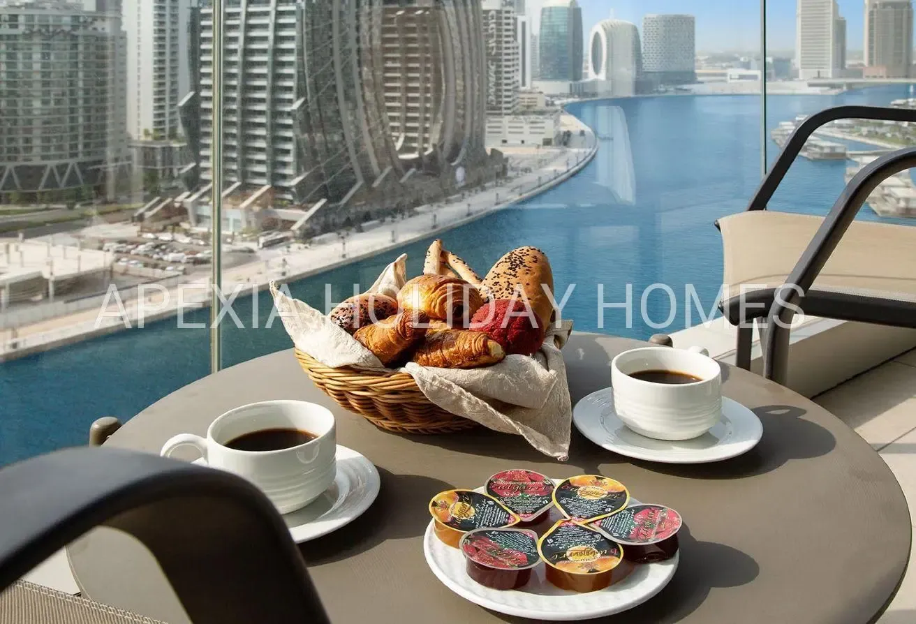 Burj & Canal View 2BR | Furnished Apartment