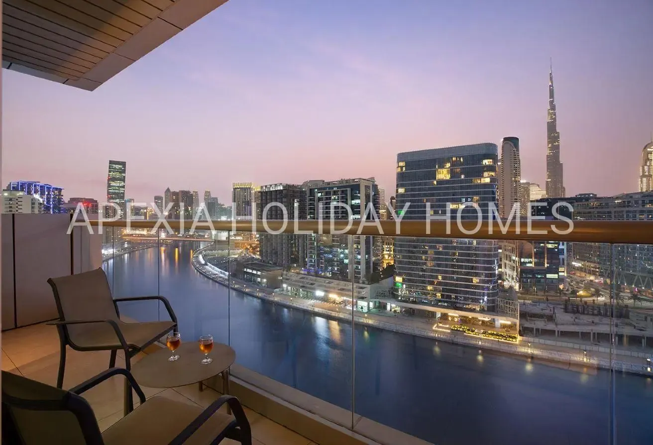Burj & Canal View 2BR | Furnished Apartment