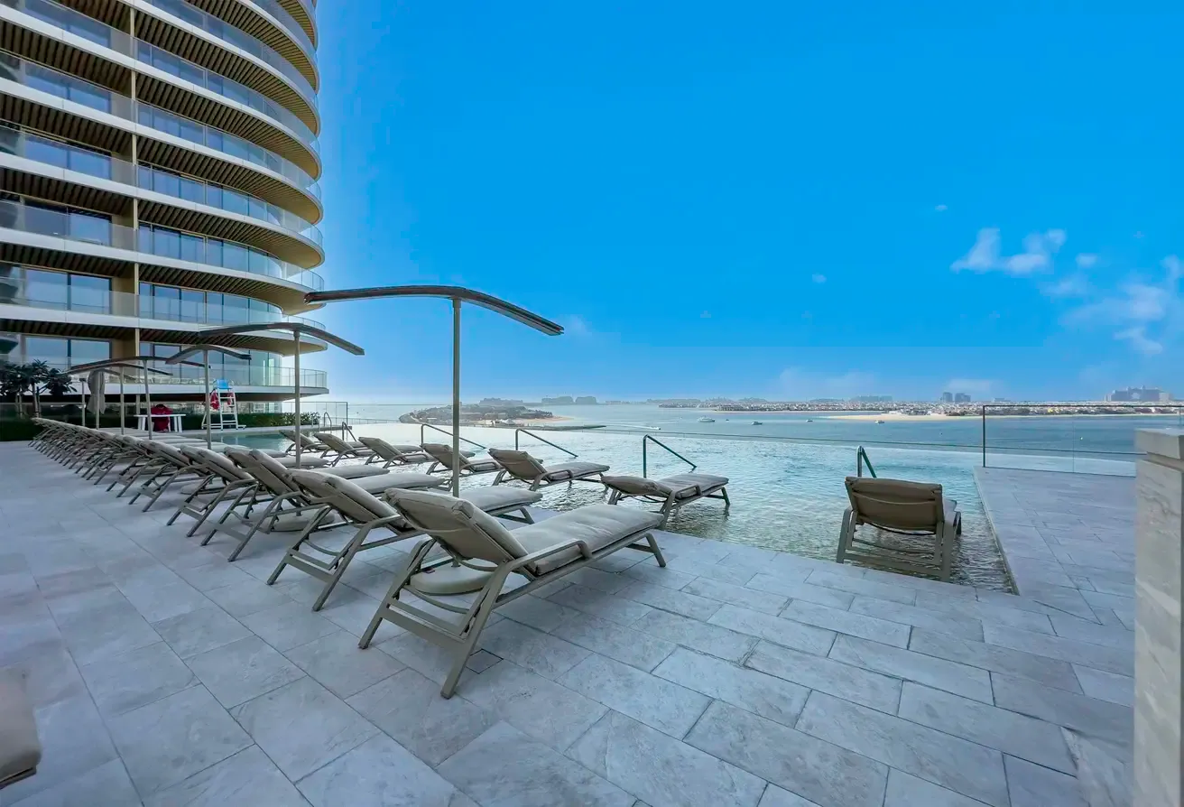 Exclusive Beachfront 2 Bed with Pool & Palm View