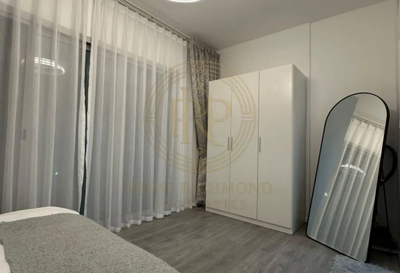 Furnished 1BR Studio‑Style | Pool & SZR Views