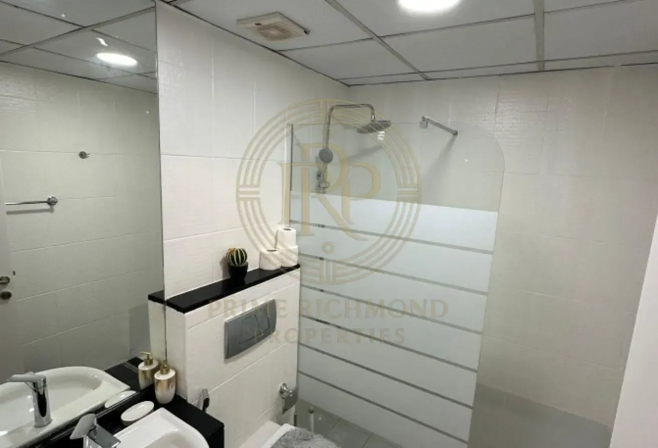 Furnished 1BR Studio‑Style | Pool & SZR Views
