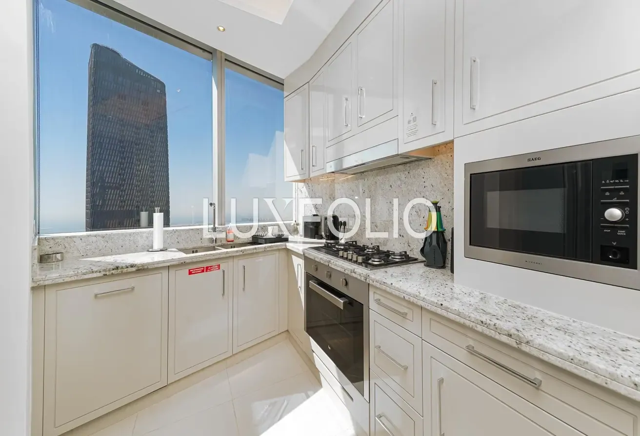 Penthouse | Fully Upgraded | Burj & Sea View