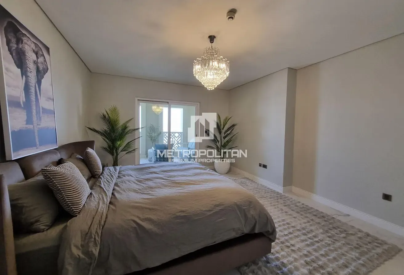 Upgraded| Fully Furnished| Beach Access| Palm View