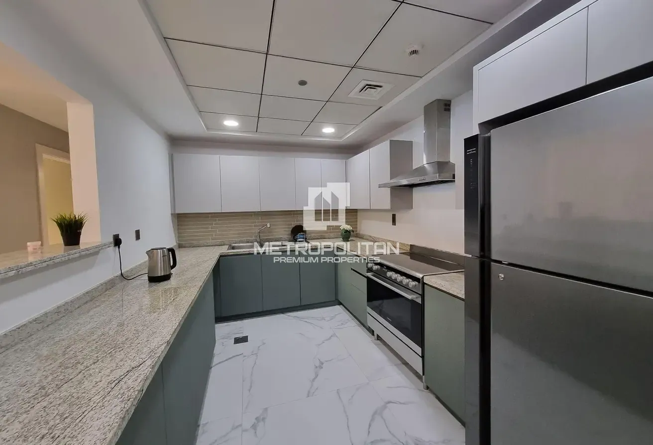 Upgraded| Fully Furnished| Beach Access| Palm View