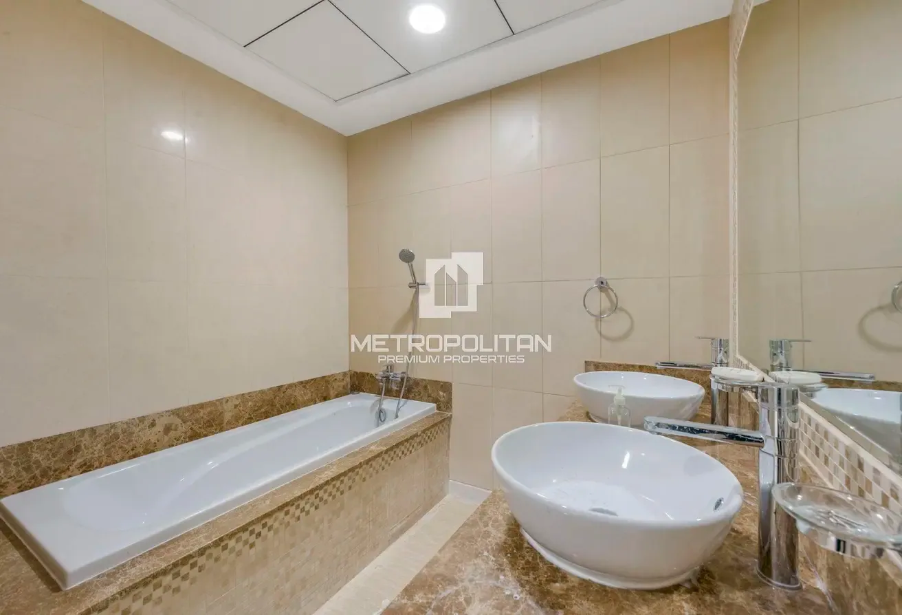 Upgraded| Fully Furnished| Beach Access| Palm View