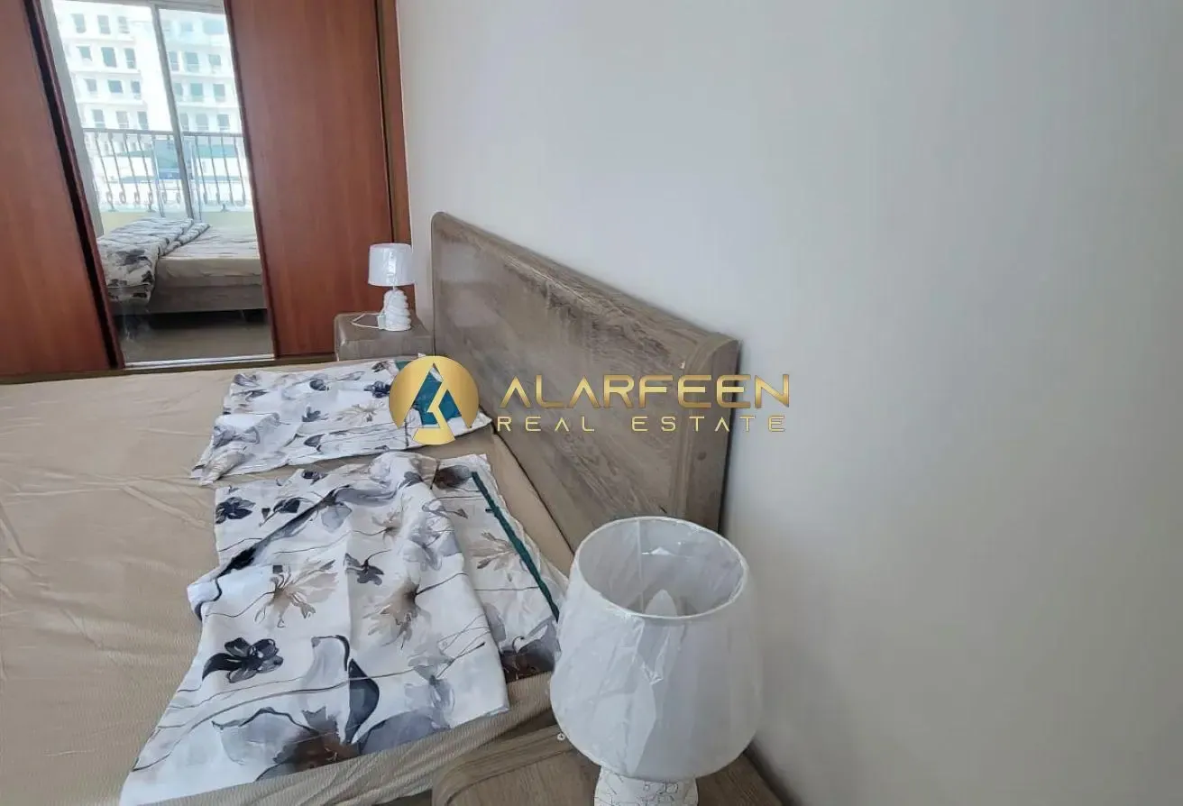 Furnished 1BR Apartment | Axis 2 | Balcony & City