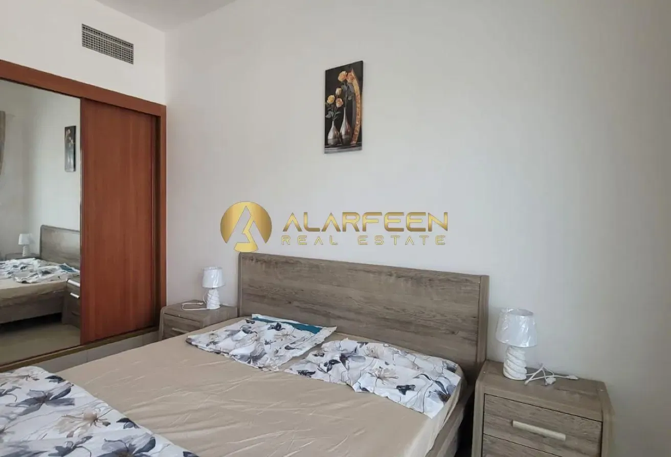 Furnished 1BR Apartment | Axis 2 | Balcony & City