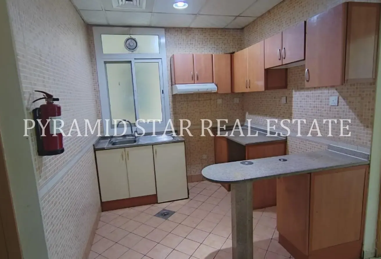 1BR + Balcony | AED 52K | Axis Residence 4