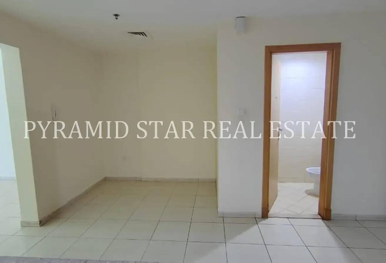 1BR + Balcony | AED 52K | Axis Residence 4