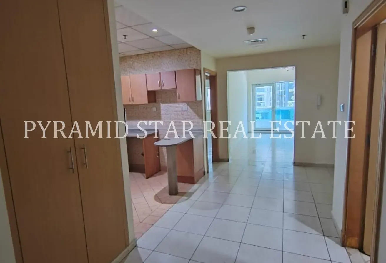 1BR + Balcony | AED 52K | Axis Residence 4